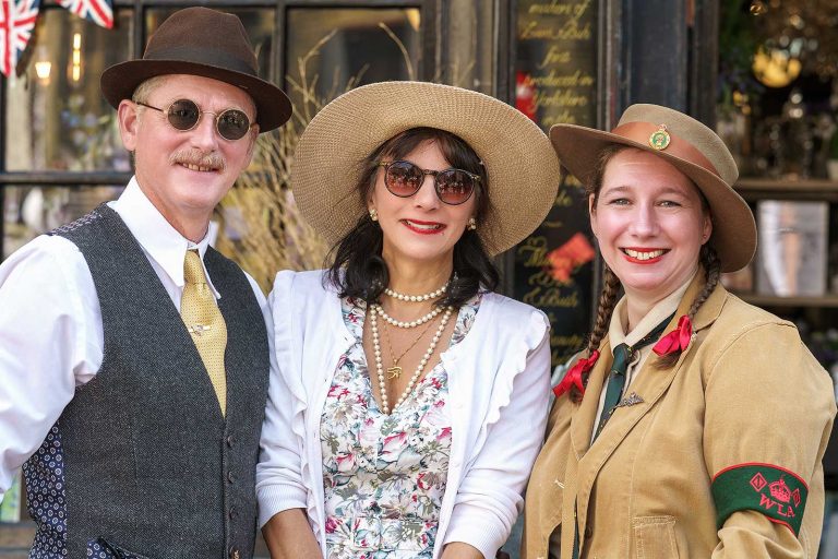 Street portrait of 3 people at Haworth 1940's weekend 2023