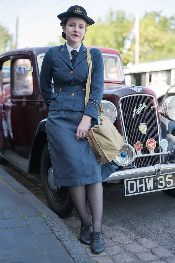 Young woman with 1940's Austin car