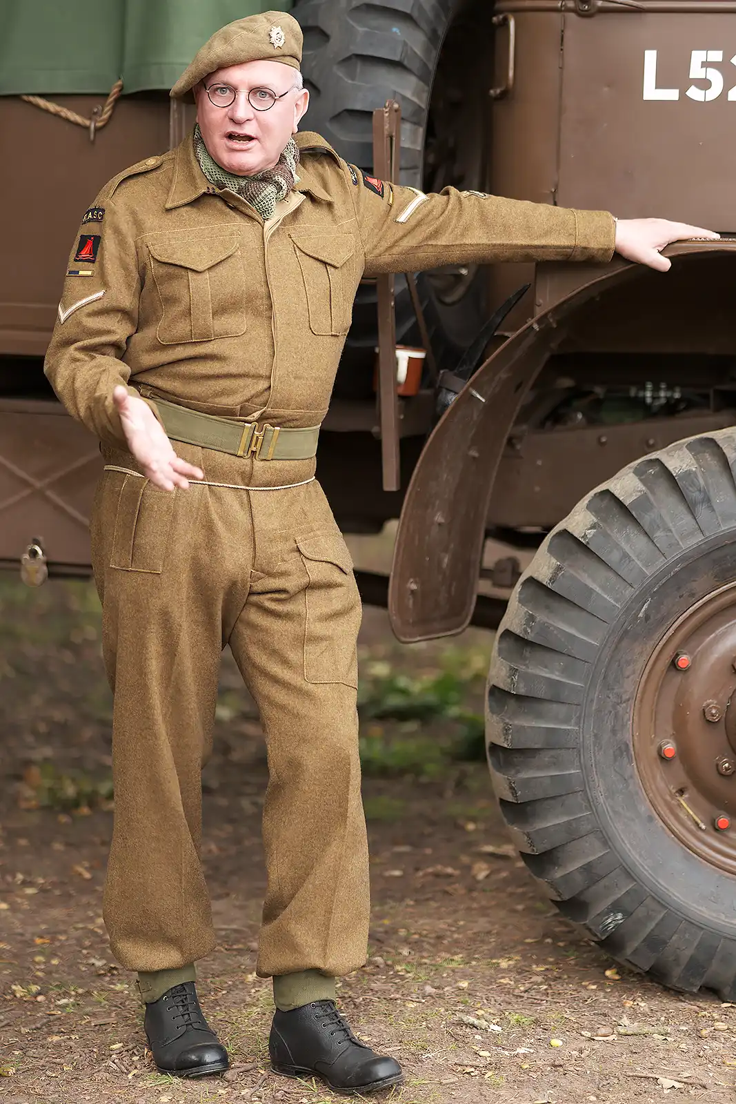 Army portrait by truck